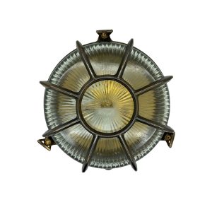 Large Capstan bulkhead light in solid antique brass and rated IP64, on white background.