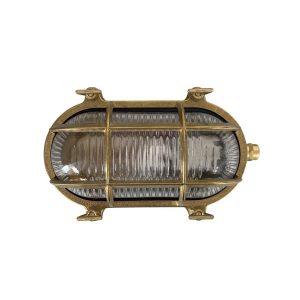 Small solid raw brass oval bulkhead light, rated IP64, on white background.