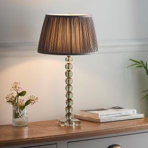 Adelie grey-green crystal table lamp with charcoal silk shade on living room sideboard