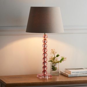 Adelie stacked blush crystal table lamp with grey linen mix shade on living room sideboard