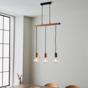 Sven 3 light bar pendant in natural wood over dining room table