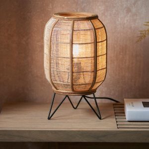 Zaire natural linen and bamboo table lamp in matt black on shelf