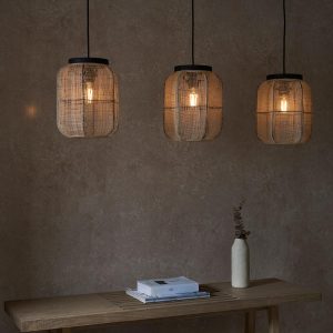 Zaire 3 light bar pendant with natural linen and bamboo shades in living room