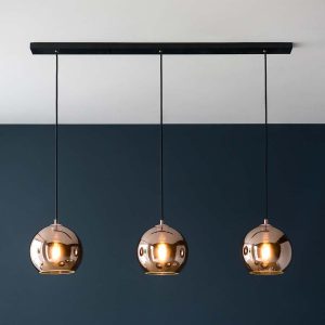 Boli 3 light bar pendant with mirrored copper glass shades in room setting