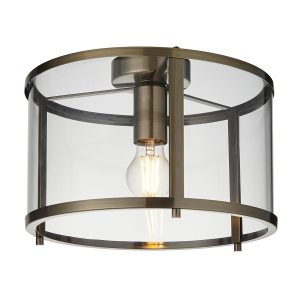 Hopton 1 lamp flush mount low ceiling light in antique brass on white background lit