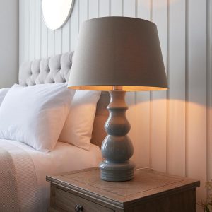 Provence grey ceramic table lamp with 45cm grey shade on bedside table lit