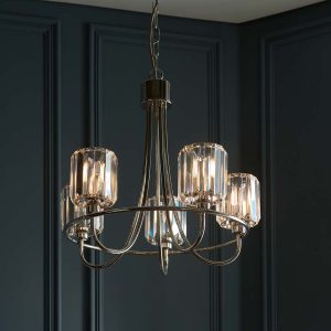 Berenice 5 light polished nickel chandelier hanging in room