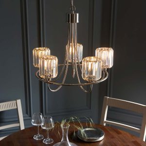 Berenice 5 light polished nickel chandelier over dining room table