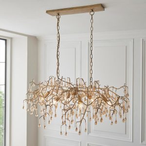Branch aged gold finish 6 light linear chandelier in panelled room