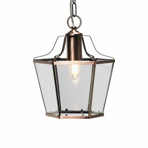 Dulverton 1 light hanging lantern in brushed copper shown lit on white background