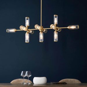 Satin brass 13 light bar pendant with ribbed glass shades and frosted glass inners, shown over a dining room table.