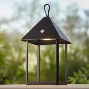 Hoot medium outdoor table lantern in black and rated IP44 on garden table