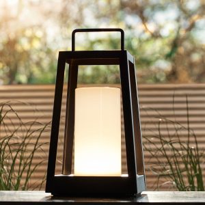 Tallow rechargeable outdoor table lantern in matt black on garden table