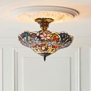 Sullivan Tiffany 3 light semi flush ceiling light with floral design, shown fitted on room ceiling.