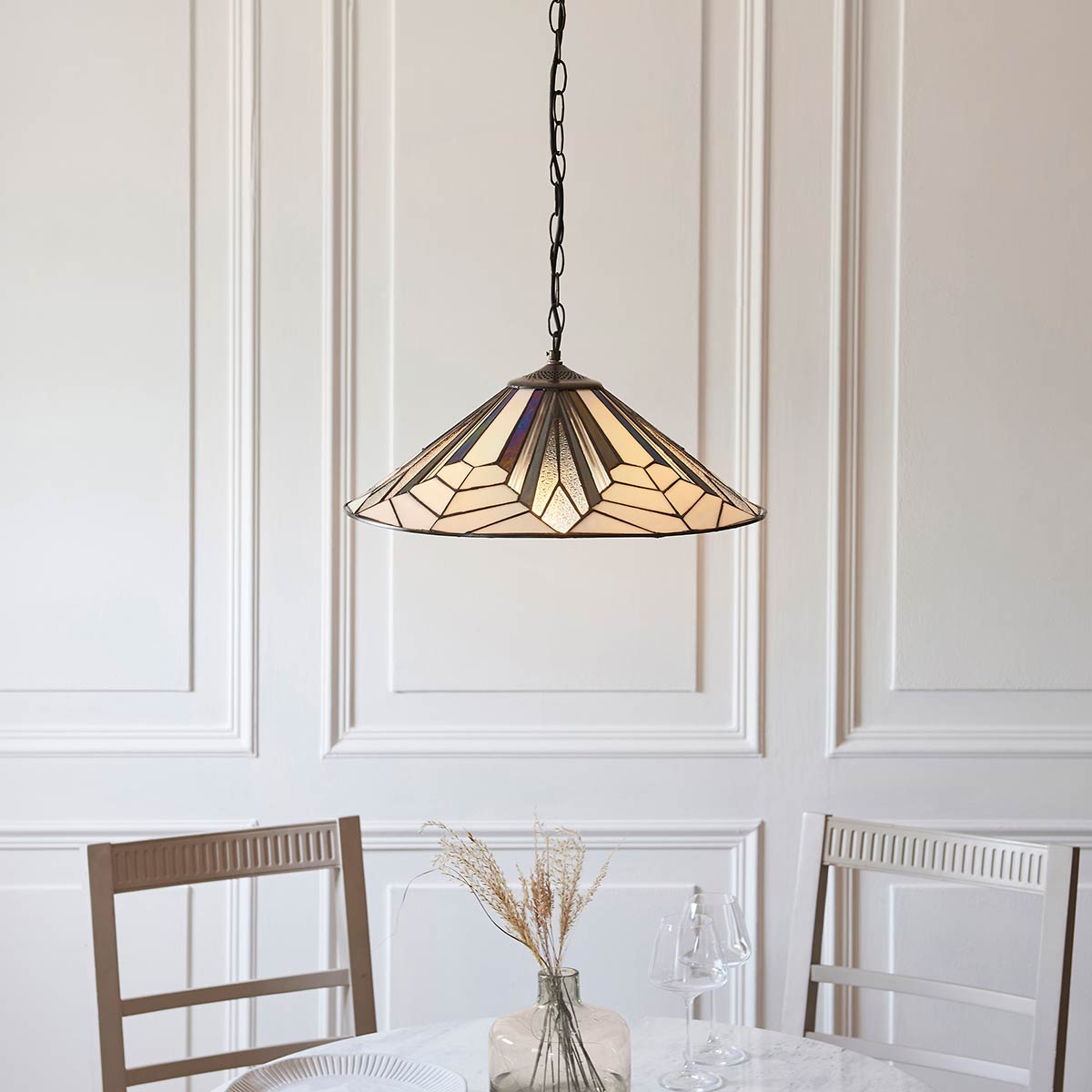 Astoria Tiffany 3 light pendant with Art Deco style, shown over a dining table.