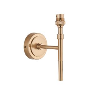 Traditional single wall light fitting only in aged brass finish on white background.