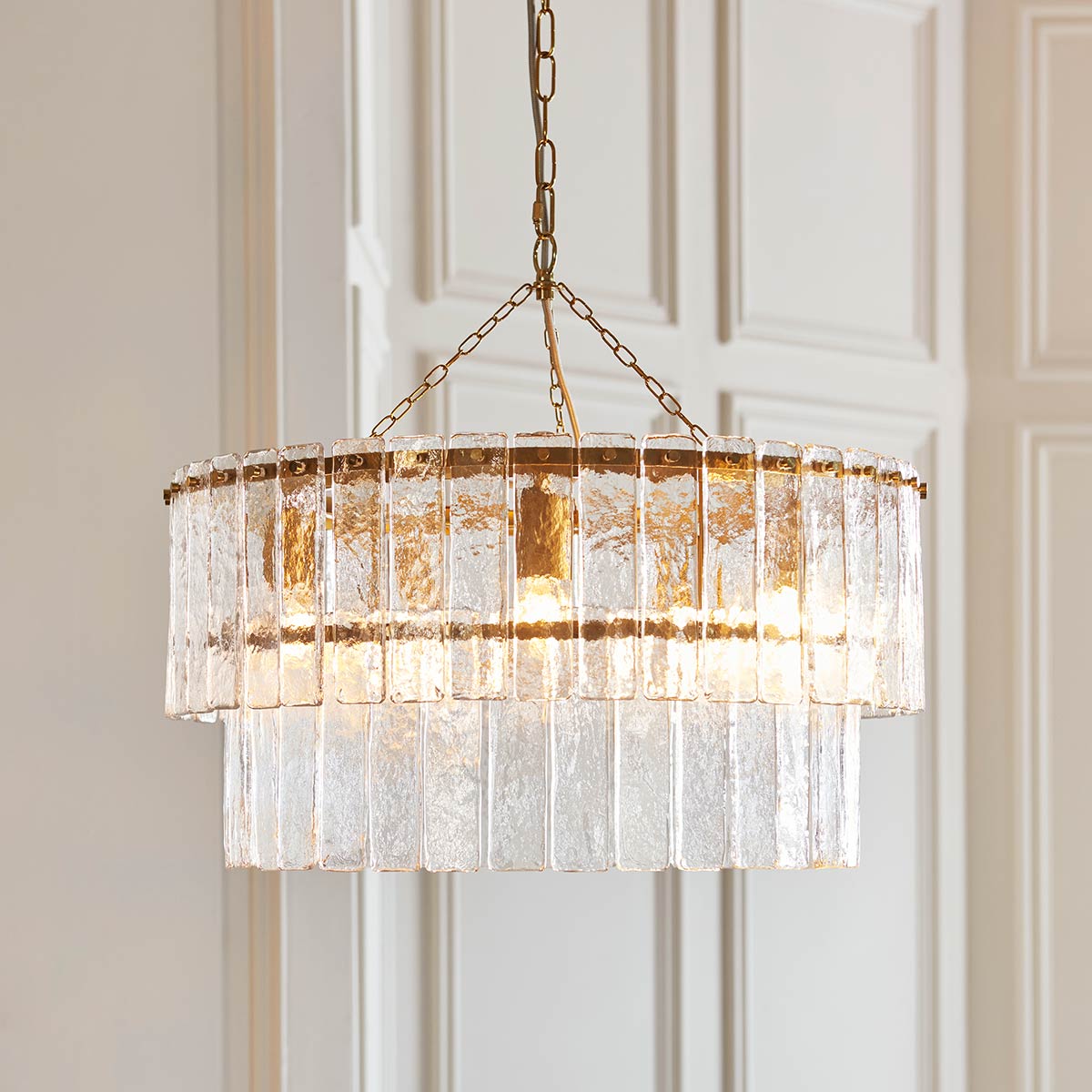 Karine 5 Light Tiered Pendant in Aged Brass with Textured Glass