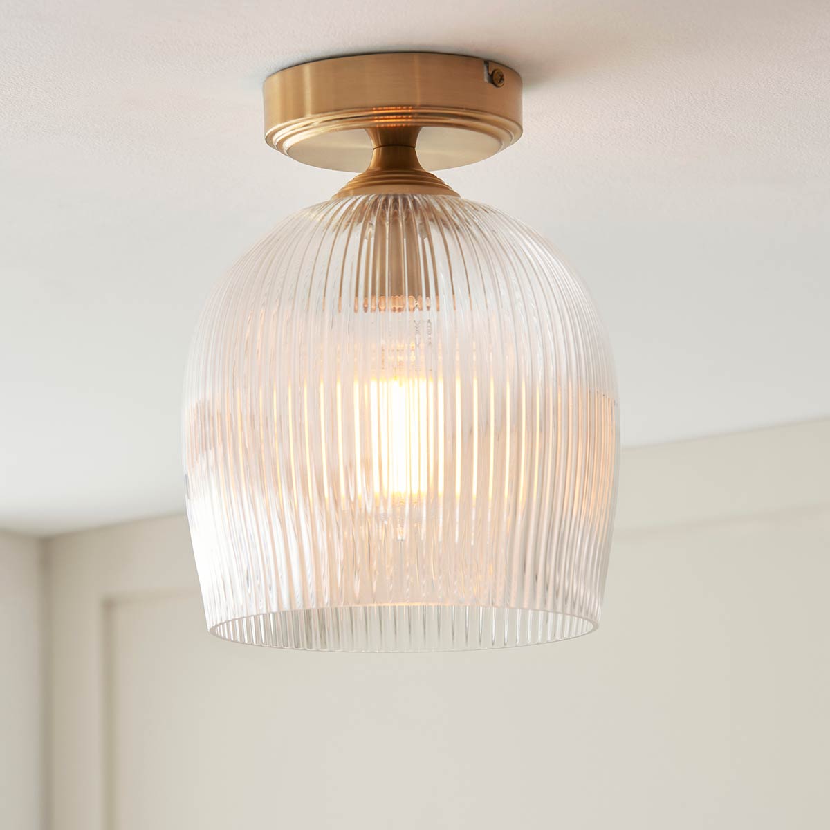 Ashcroft Single Light Flush in Aged Brass with Ribbed Glass