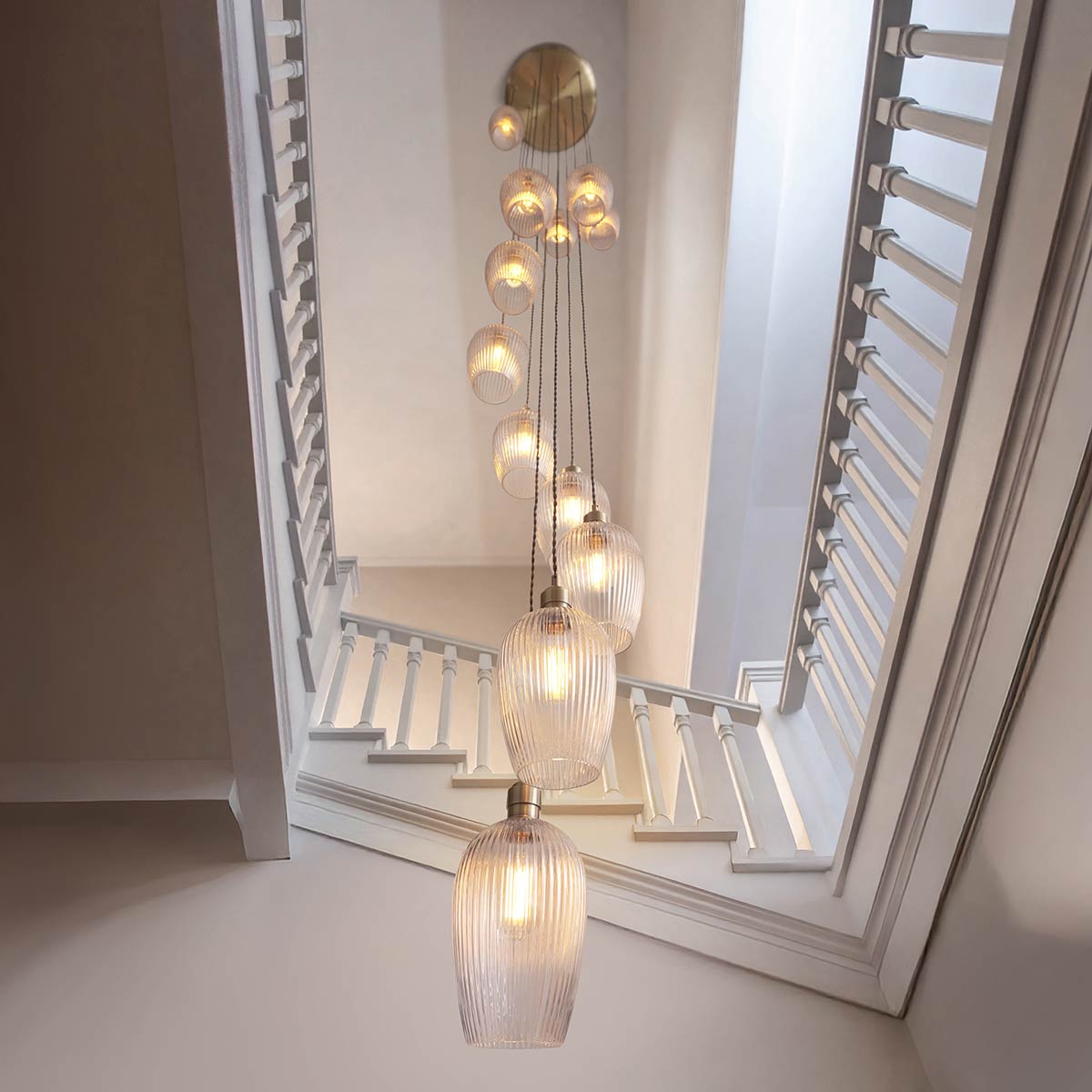 13 Light Stairwell Pendant in Antique Brass with Ribbed Glass