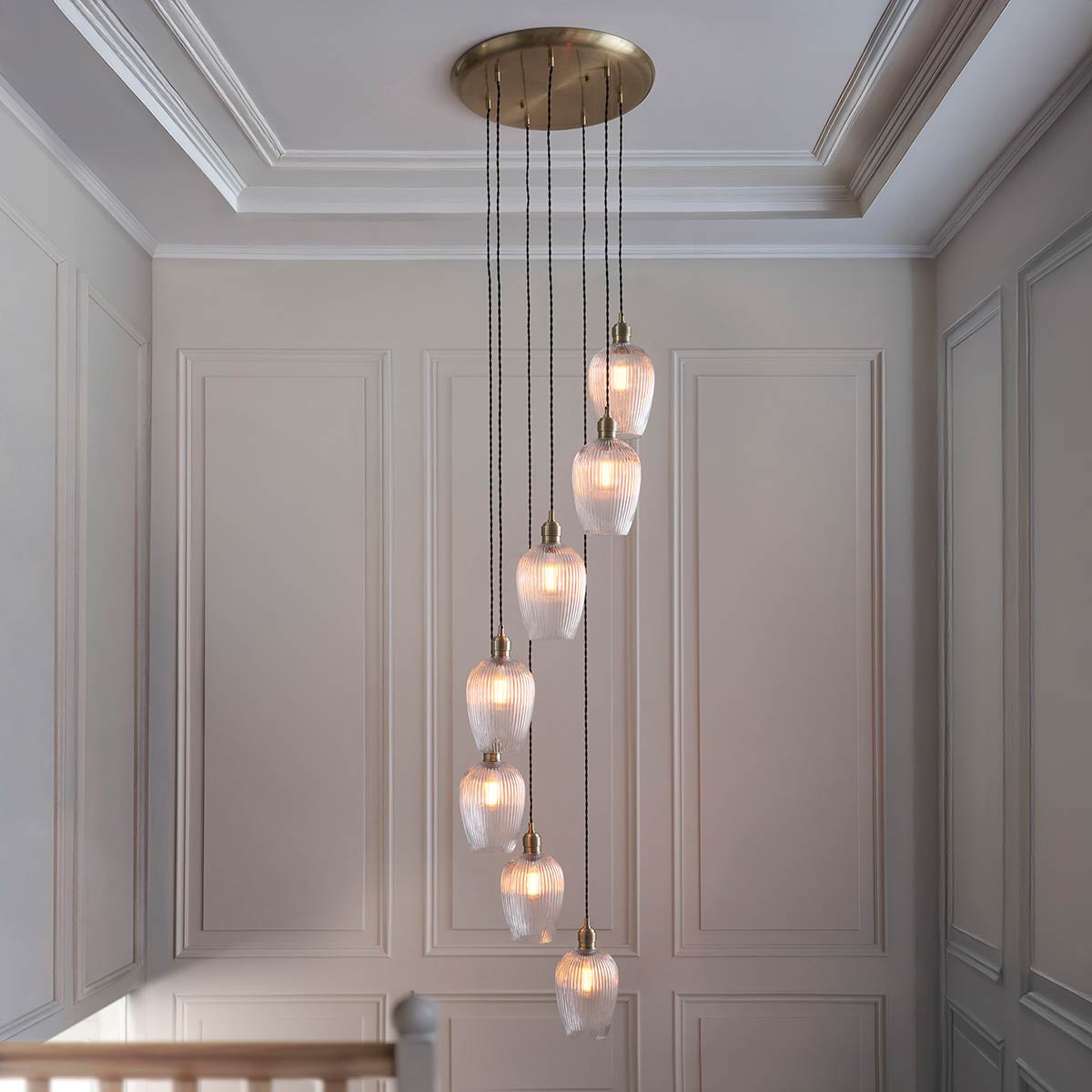 7 Light Stairwell Pendant in Antique Brass with Ribbed Glass