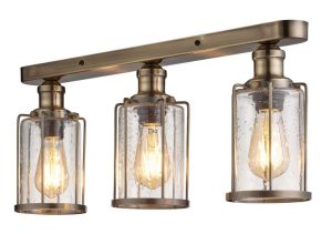 Pipes 3 light flush mount ceiling light in antique brass with seeded glass