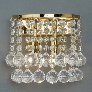 Hanna curved 2 lamp crystal wall light in polished gold on grey background