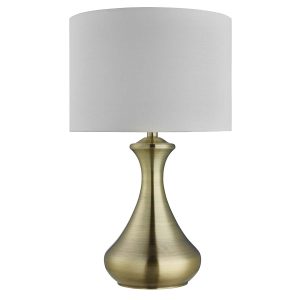 Touch bedside table lamp in antique brass with cream shade on white background