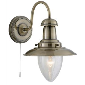 Fisherman switched wall light in antique brass on white background