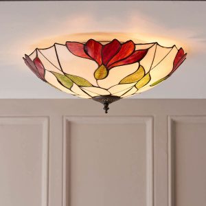 Botanica large flush Tiffany ceiling light with floral design, shown on panelled room ceiling.