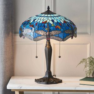 Blue Dragonfly medium 2 light Tiffany table lamp on lounge table lit