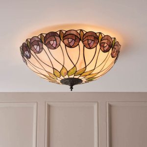 Hutchinson Mackintosh rose large flush Tiffany ceiling light, shown in panelled room.