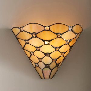 Pearl Tiffany 1 lamp wall light with geometric style, shown lit on taupe wall.