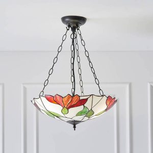Botanica large inverted Tiffany pendant light with floral design, shown in panelled room.