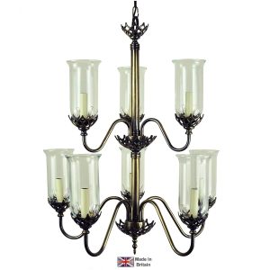 Gothic 2 tier 8 light chandelier in solid brass with storm glass shades shown in dark antique