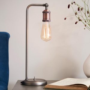 Hal 1 light industrial table lamp in aged pewter shown on lounge table