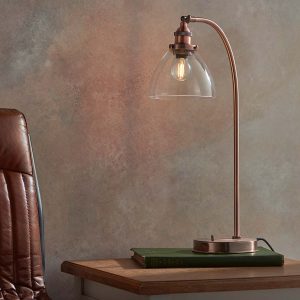 Hansen industrial table lamp in aged copper plate on sitting room side table