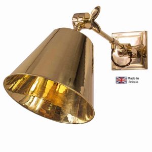 Library vintage style hinged wall light in solid brass shown polished