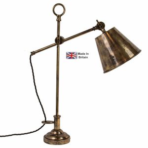 Library vintage style adjustable desk lamp in solid brass shown finished in light antique