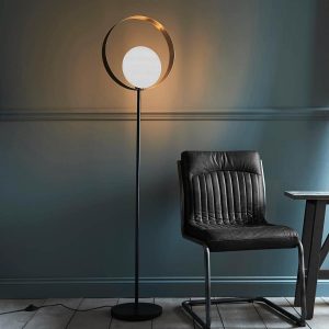 Cal contemporary 1 light floor lamp in satin nickel and matt black in lounge next to chair