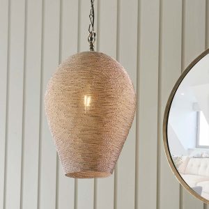 Paresh single light pendant with polished nickel plated wire shade, in room setting