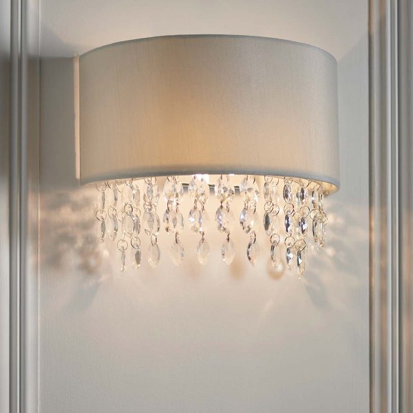 Malmesbury wall washer light with grey silk mix shade and crystal drops on lounge wall