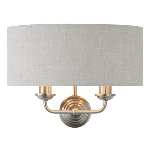 Highclere twin wall light with natural linen shade in brushed chrome on white background