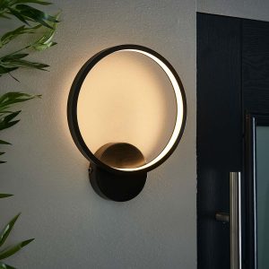 Endon Kieron modern LED outdoor wall light in textured black shown next to front door
