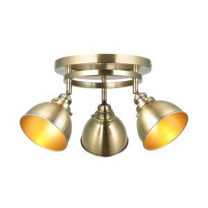 Wyatt round 3 lamp industrial spot light plate in antique brass on white background lit