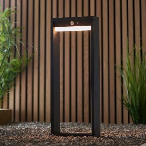 Dannah modern 50cm solar outdoor post light in textured black in garden setting