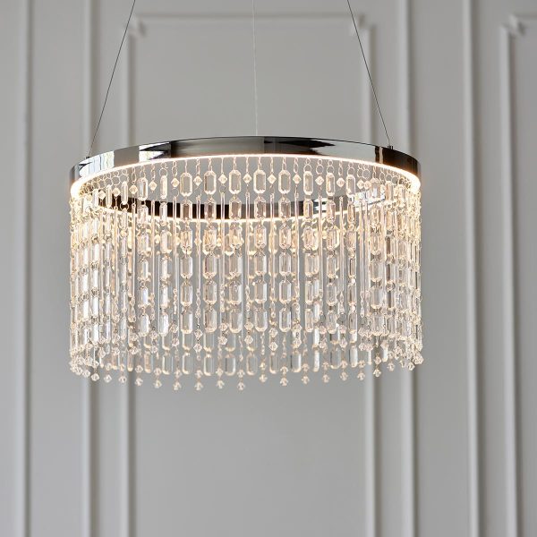 Liliana LED crystal pendant light in polished chrome in grey panelled room