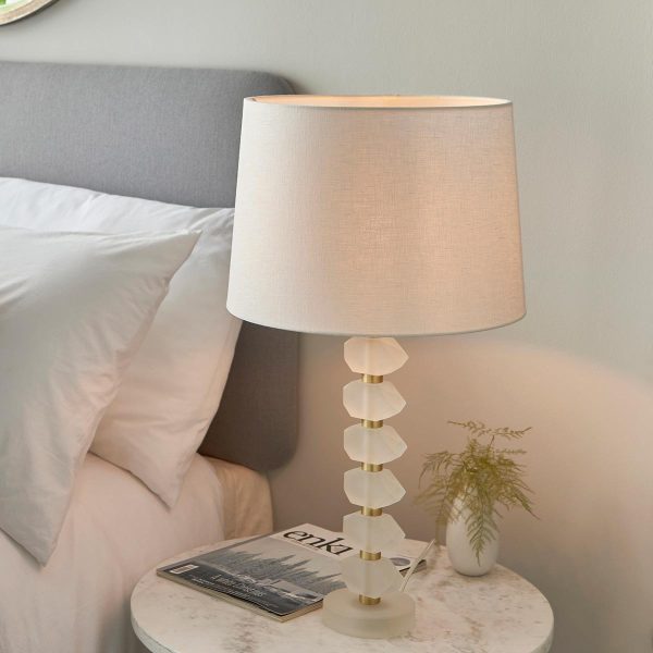 Annabelle frosted crystal table lamp in brushed gold with vintage white linen shade on bedside table
