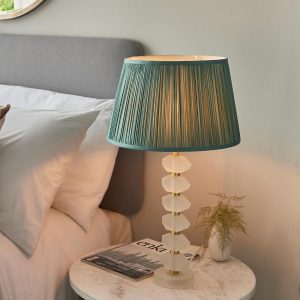 Annabelle frosted crystal table lamp in brushed gold with fir silk shade on bedside table