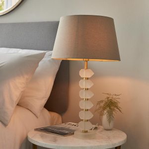 Annabelle frosted crystal table lamp in brushed gold with grey shade on bedside table