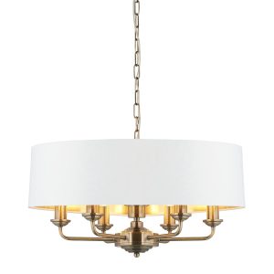 Highclere 6 light pendant in antique brass with vintage white shade on white background